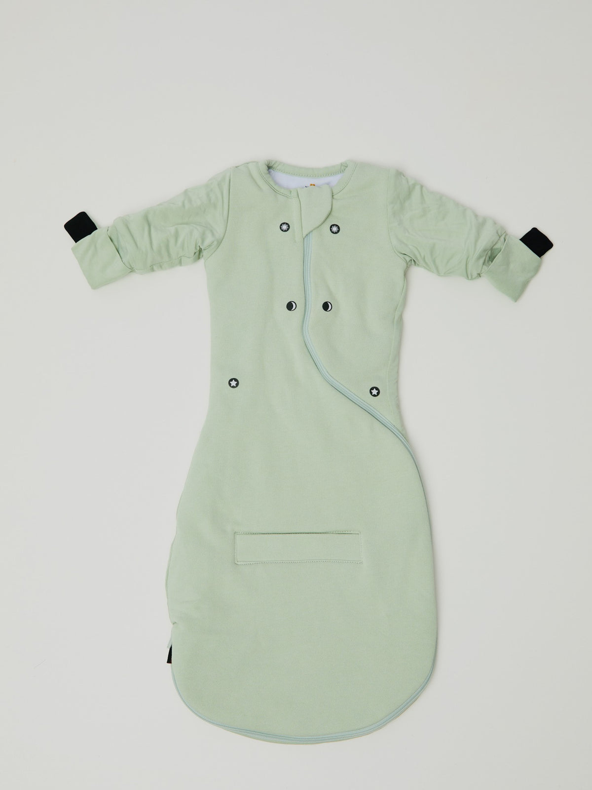 Swaddle Easy in Sage Green laid flat, showing the three magnet spots on the front: up near the face, in the middle and down by the sides